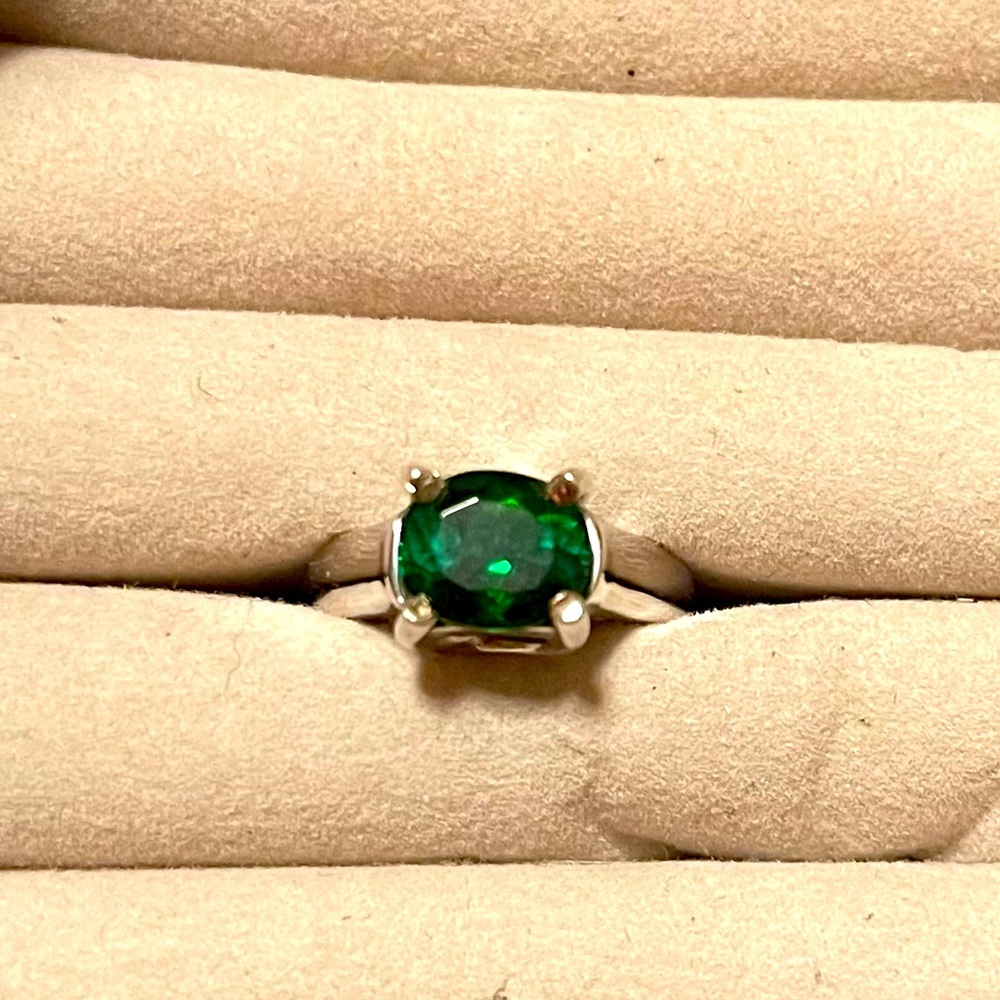 Custom designed 14K white gold ring with 2.01 Ct green tourmaline stone.
